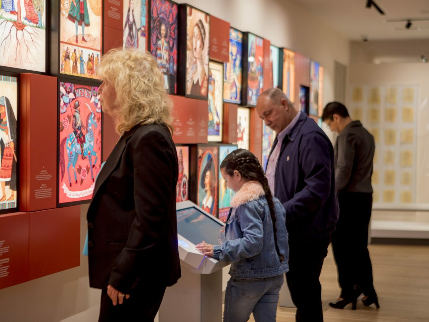 Visitor exploring a tablet interactive